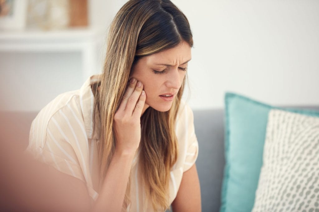 When Your Tooth Hurts Only When You Bite: Common Causes and What to Do Next